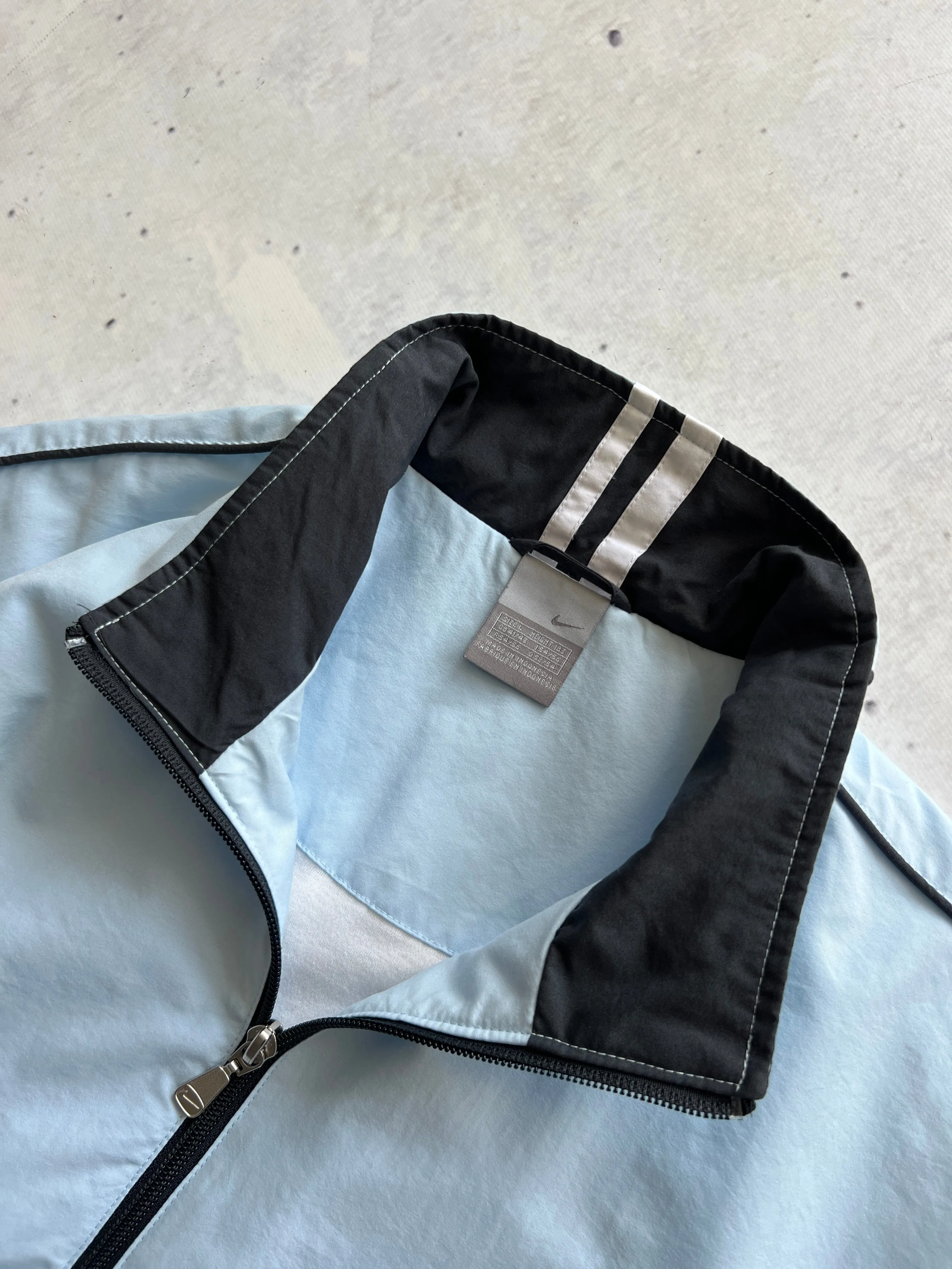 00's Nike baby blue zip up track jacket (L)