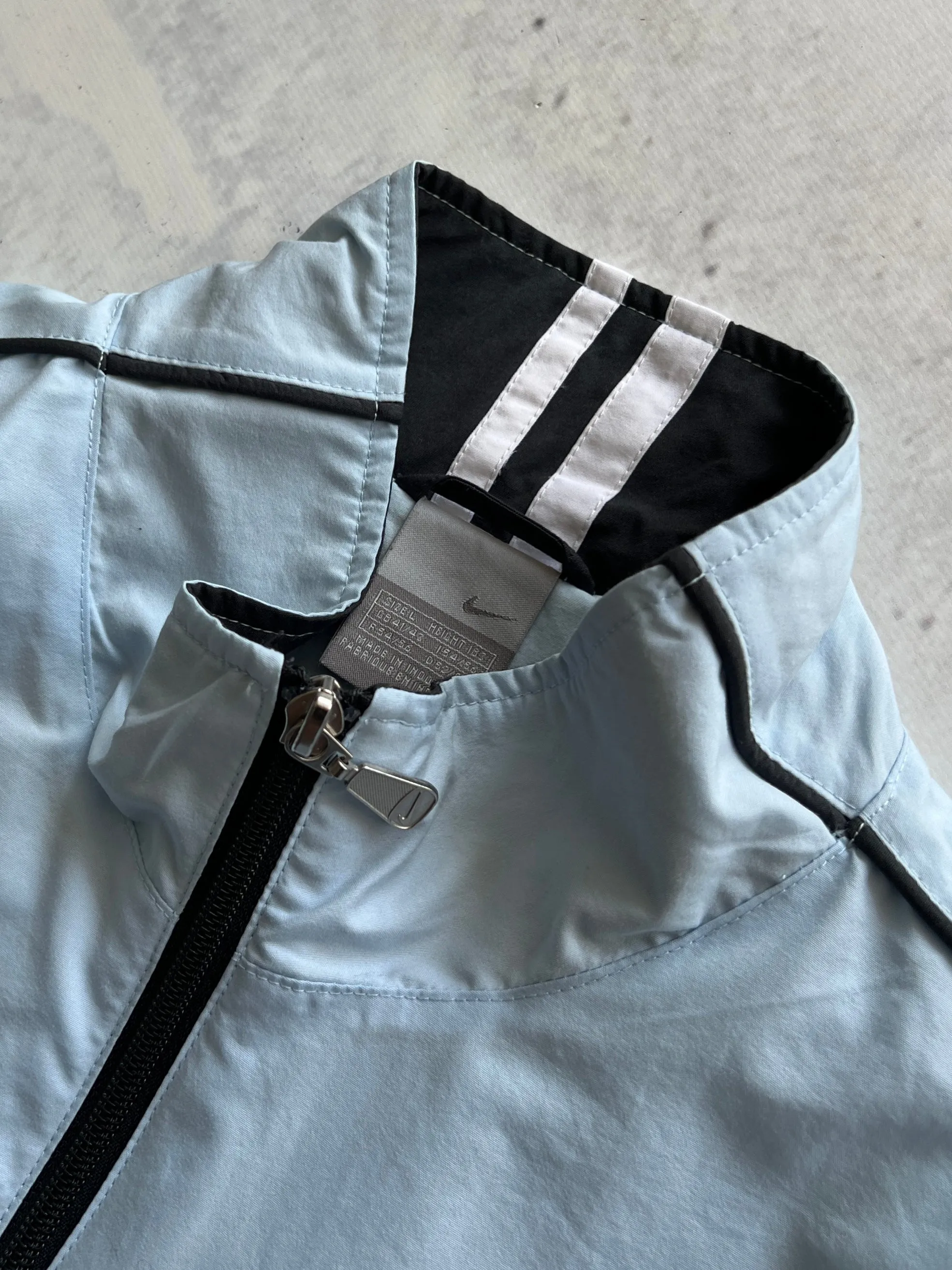 00's Nike baby blue zip up track jacket (L)