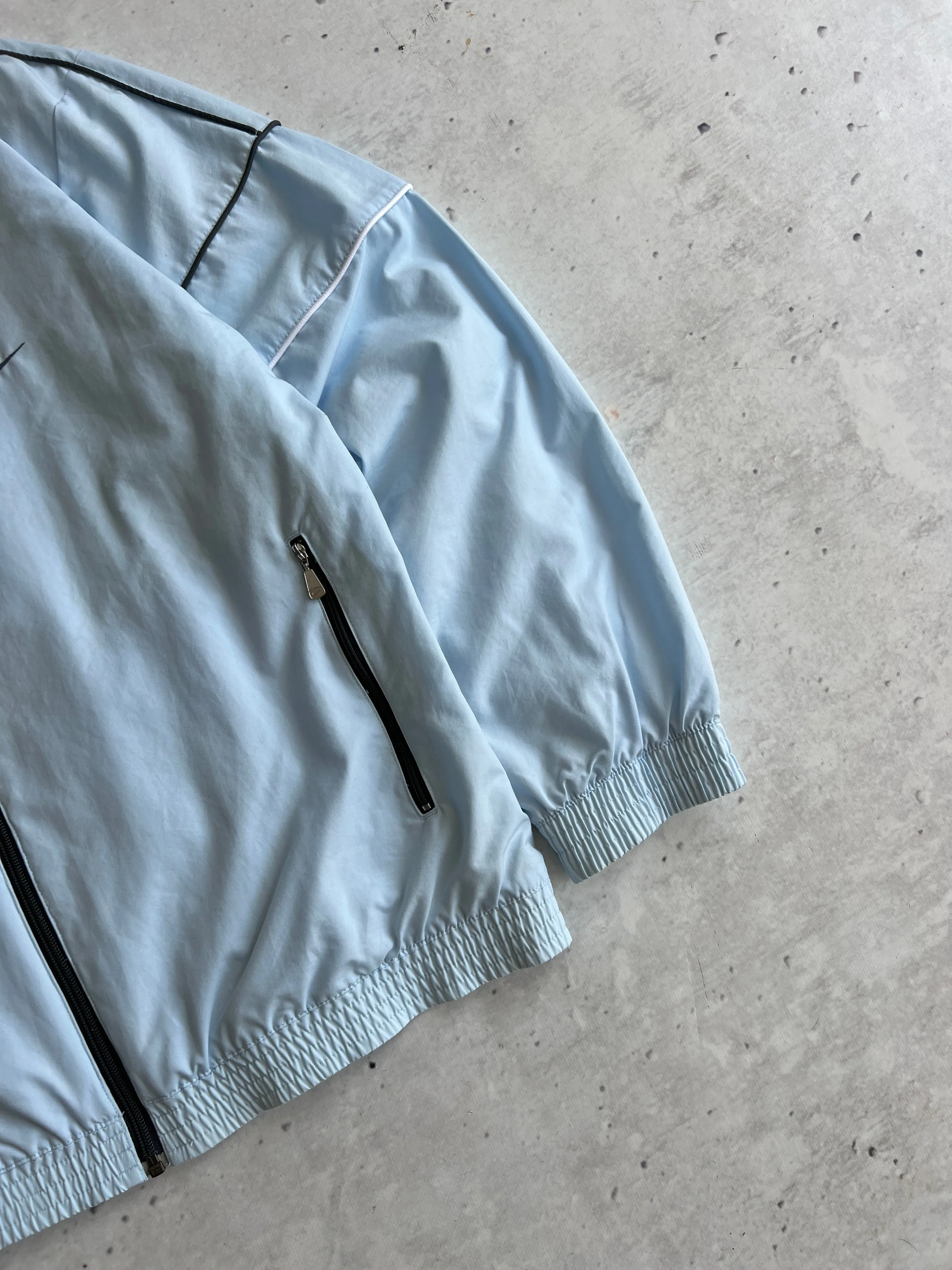 00's Nike baby blue zip up track jacket (L)